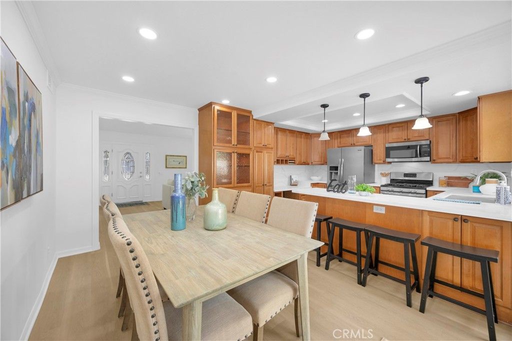 Dining room, Interior, Kitchen, Pendant Lights, Recessed Lighting, Stainless Steel Appliances, Wood Texture Flooring