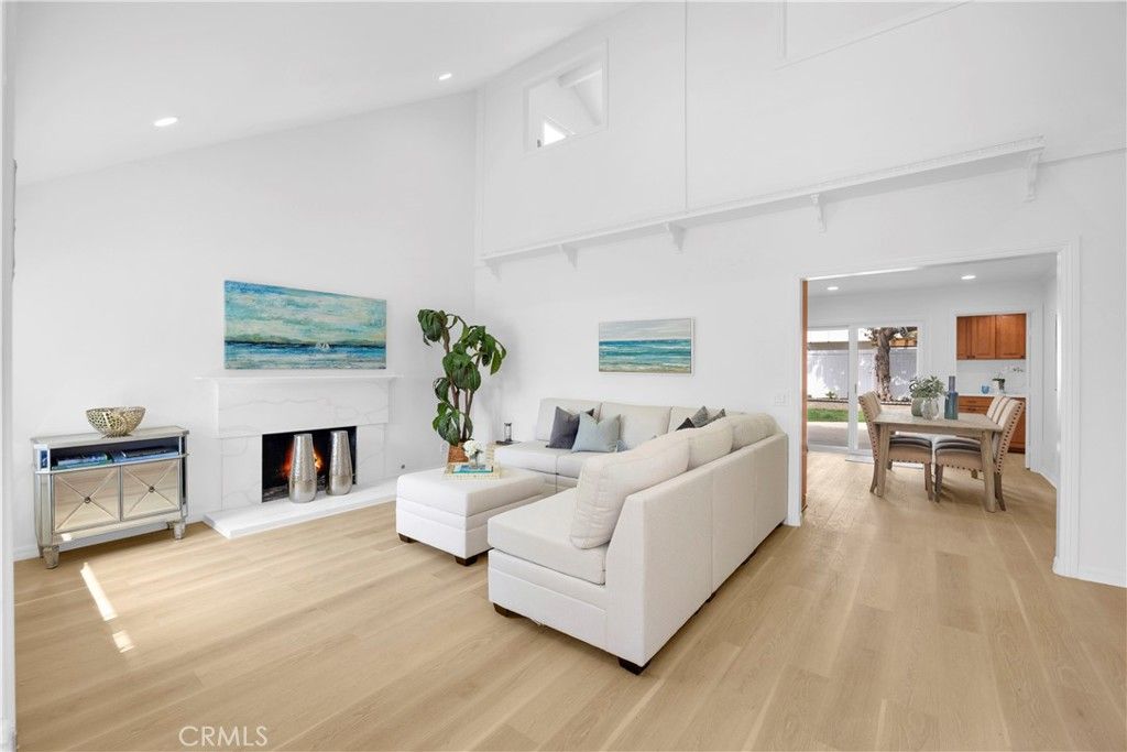 Dining room, Fireplace, Interior, Living room, Recessed Lighting, Wood Texture Flooring