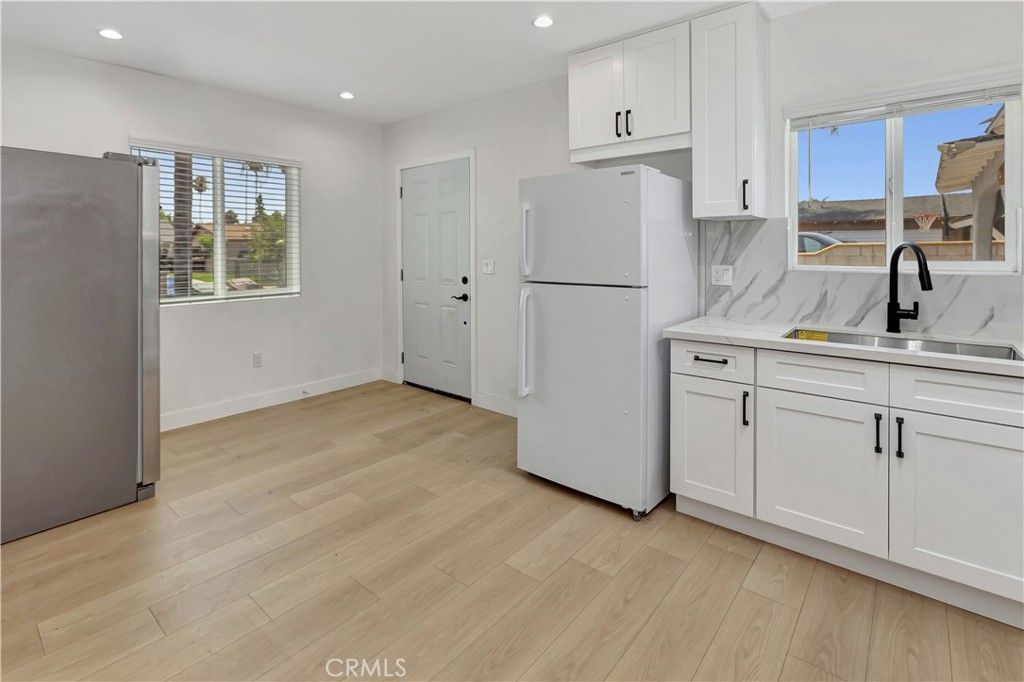 Interior, Kitchen, Marble Walls, Recessed Lighting, Wood Texture Flooring