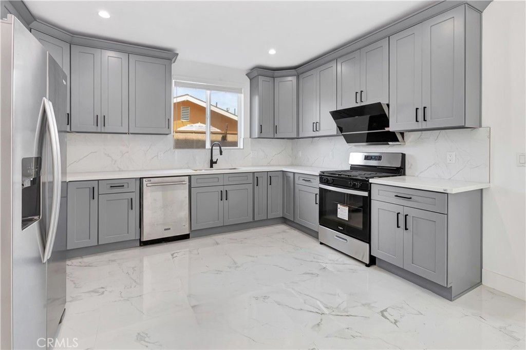 Interior, Kitchen, Marble, Marble Walls, Recessed Lighting, Stainless Steel Appliances