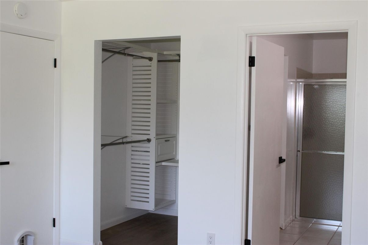 Bathroom, Glass Shower, Interior, Walk-in Closets, Wood Texture Flooring