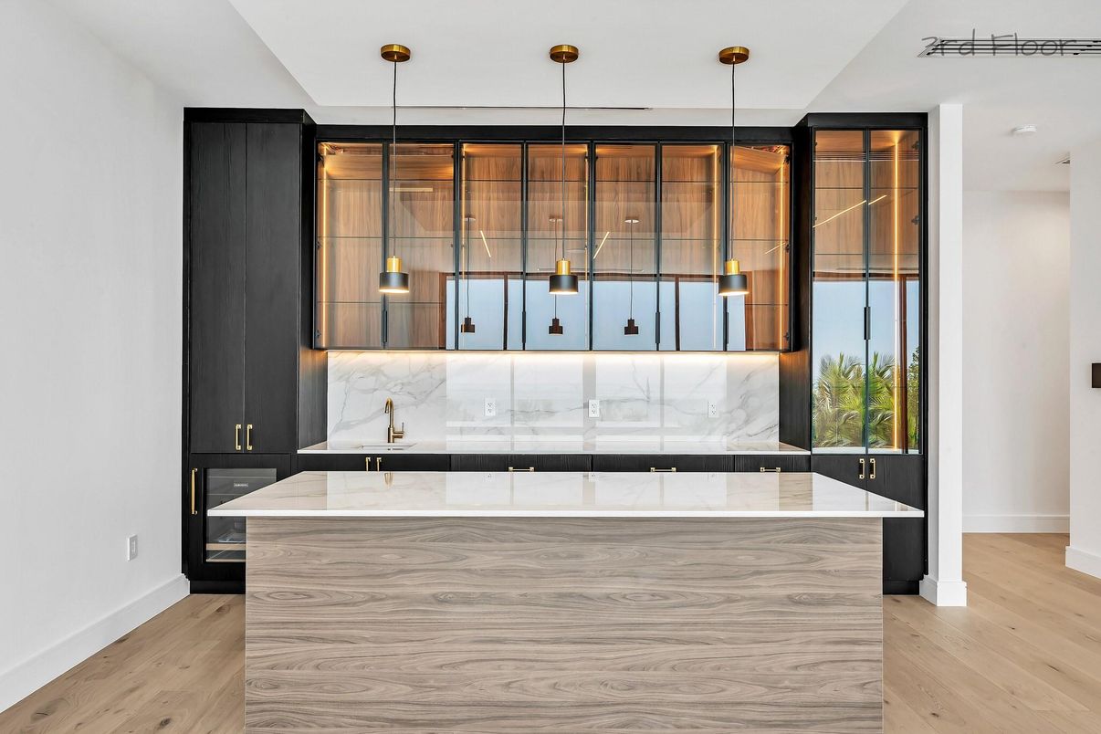 Interior, Kitchen, Marble Walls, Pendant Lights, Recessed Lighting, Wood Texture Flooring