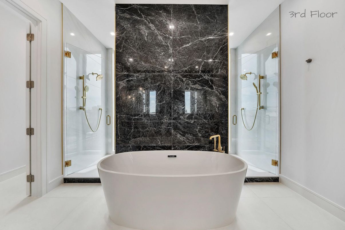 Bathroom, Free Standing Baths, Glass Shower, Interior, Marble Walls, Recessed Lighting