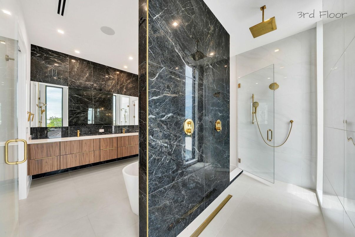 Bathroom, Dual Sink Vanities, Glass Shower, Interior, Marble Walls, Recessed Lighting