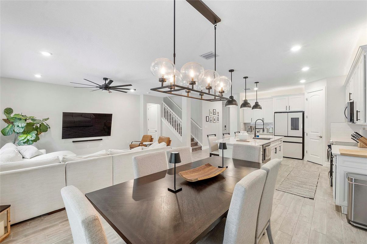 Dining room, Interior, Kitchen, Living room, Pendant Lights, Recessed Lighting, Stainless Steel Appliances, Wood Texture Flooring