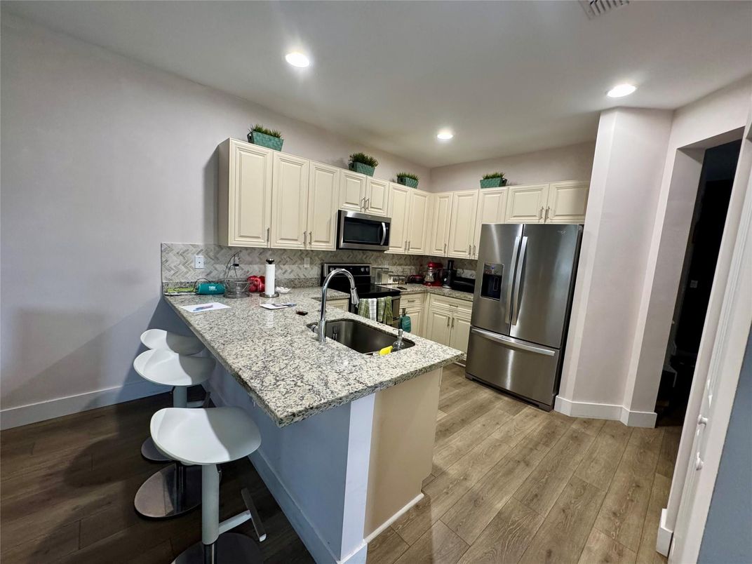 Interior, Kitchen, Recessed Lighting, Stainless Steel Appliances, Wood Texture Flooring