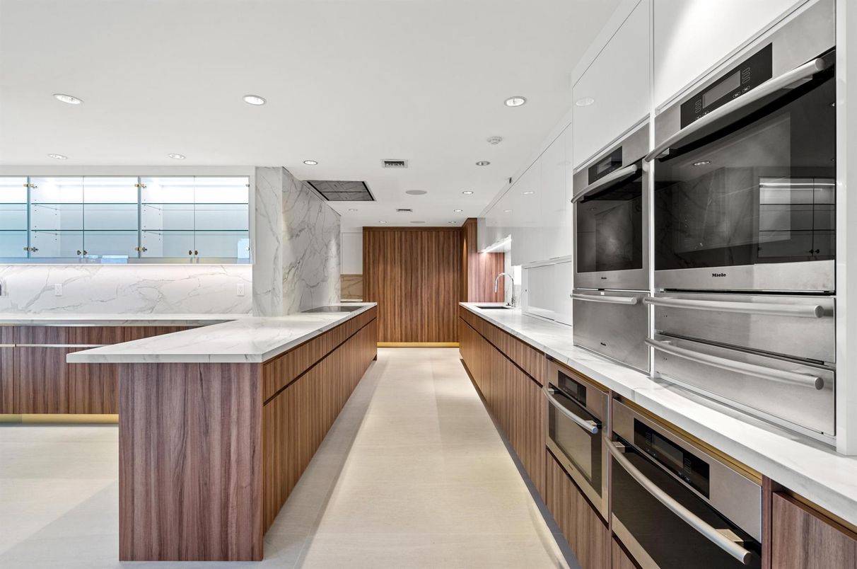 Interior, Kitchen, Marble Walls, Recessed Lighting, Stainless Steel Appliances
