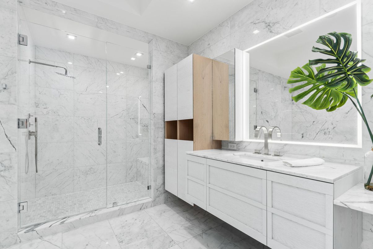 Bathroom, Dual Sink Vanities, Glass Shower, Interior, Marble, Marble Walls, Recessed Lighting