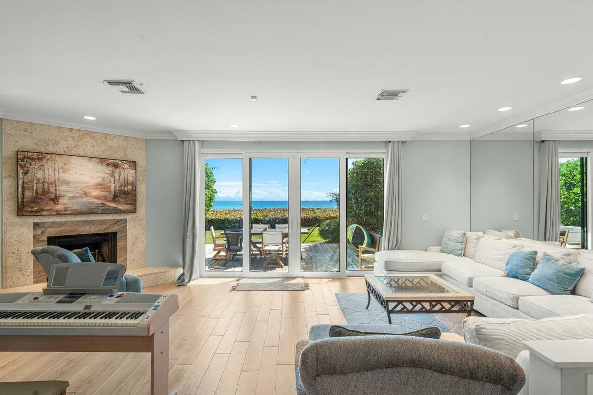 Fireplace, Interior, Living room, Recessed Lighting, Water, Wood Texture Flooring