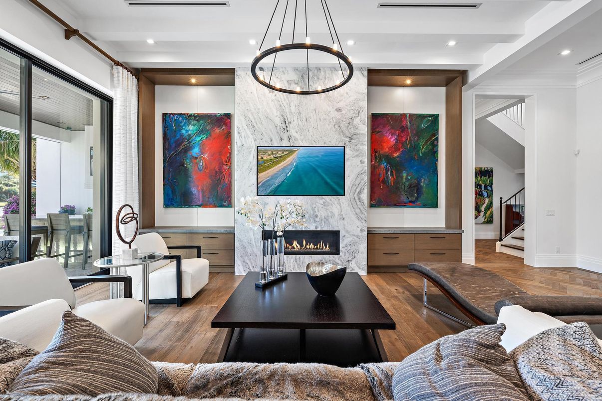 Fireplace, Interior, Living room, Marble Walls, Pendant Lights, Recessed Lighting, Wood Texture Flooring