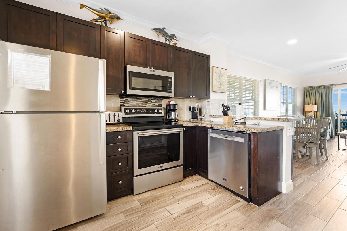 Dining room, Interior, Kitchen, Recessed Lighting, Stainless Steel Appliances, Wood Texture Flooring