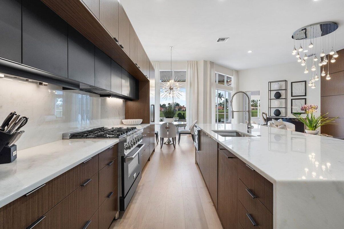 Dining room, Interior, Kitchen, Pendant Lights, Recessed Lighting, Stainless Steel Appliances, Wood Texture Flooring
