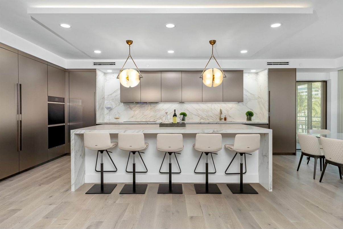 Interior, Kitchen, Marble Walls, Pendant Lights, Recessed Lighting, Stainless Steel Appliances, Wood Texture Flooring