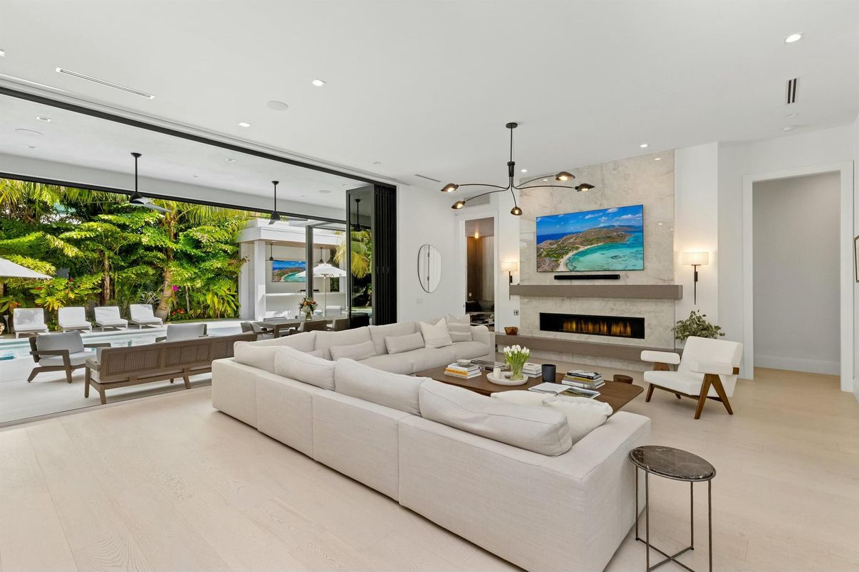 Dining room, Fireplace, Interior, Living room, Pendant Lights, Recessed Lighting, Wood Texture Flooring