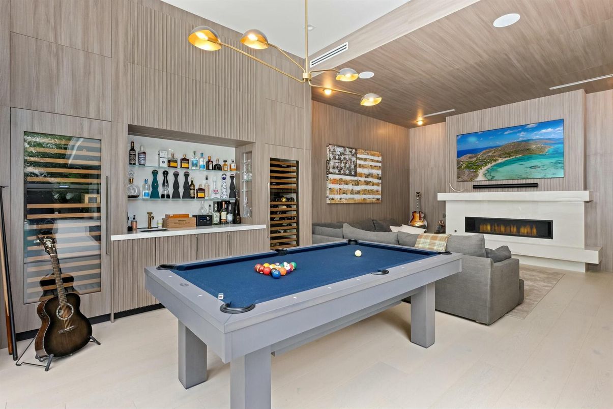 Billiard Table, Fireplace, Game Room, Interior, Pendant Lights, Recessed Lighting, Wood Texture Flooring, Wooden Walls