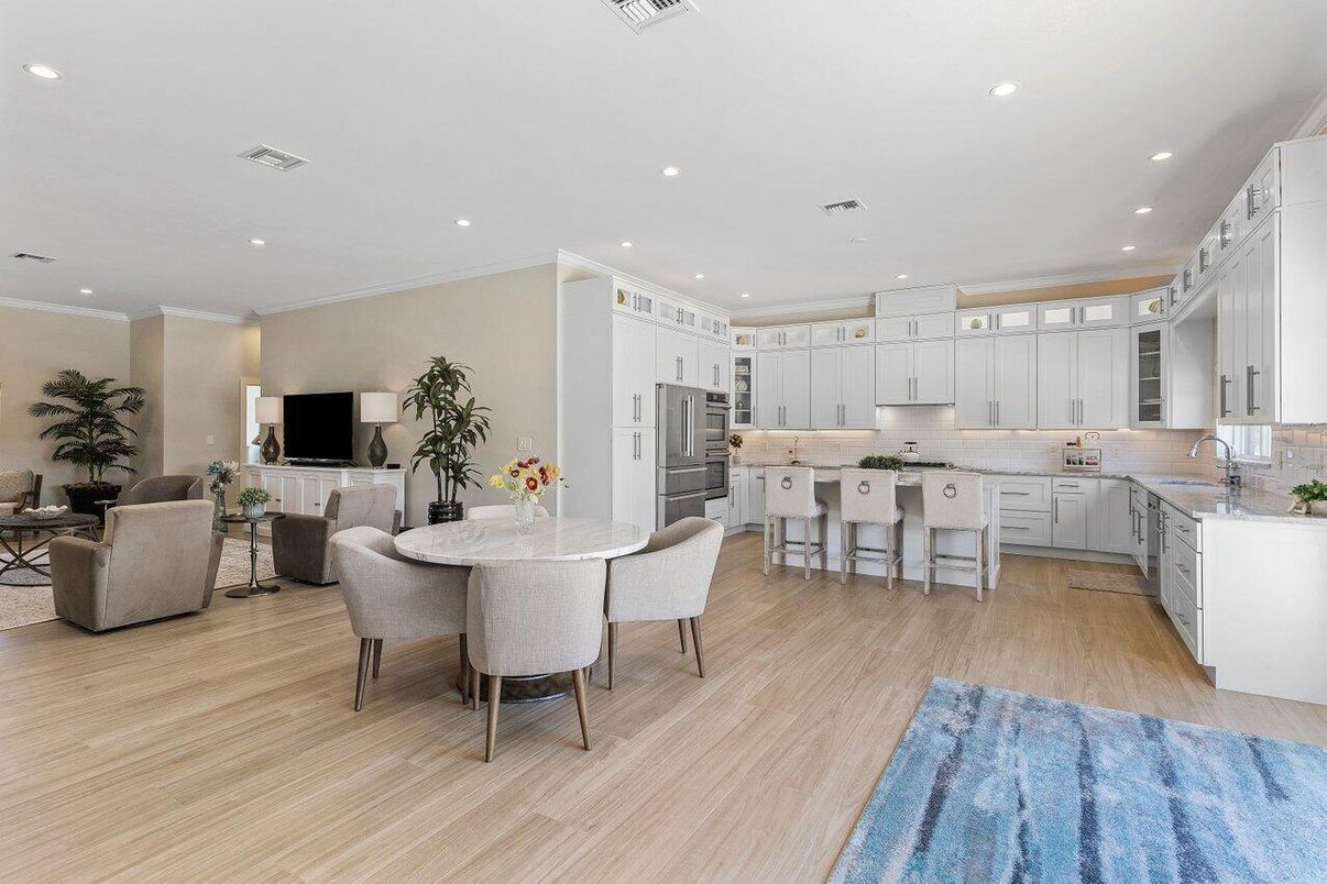 Dining room, Interior, Kitchen, Living room, Recessed Lighting, Stainless Steel Appliances, Wood Texture Flooring