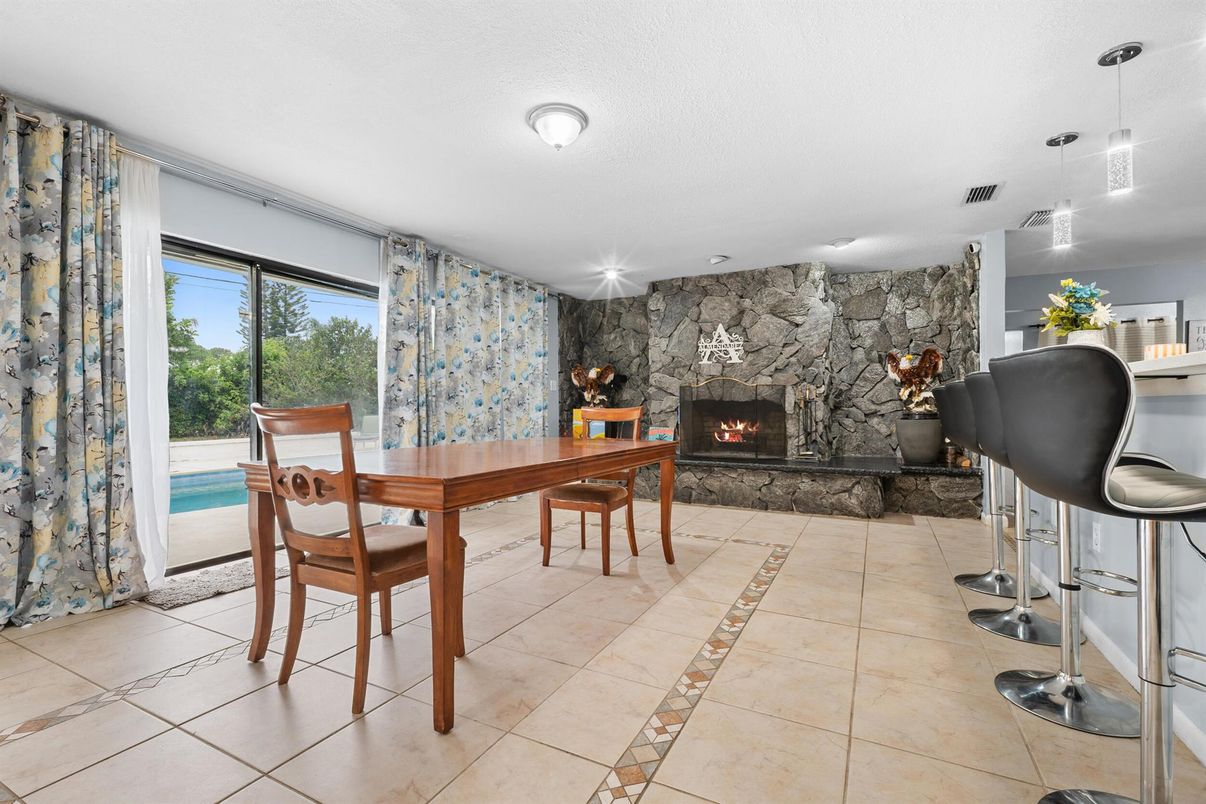 Dining room, Fireplace, Interior, Pendant Lights, Stone Walls