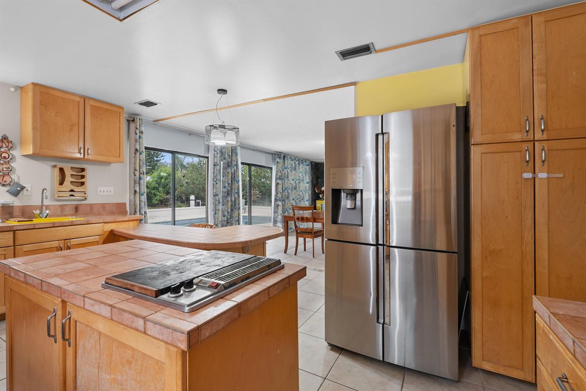 Dining room, Interior, Kitchen, Pendant Lights, Stainless Steel Appliances, Tile Countertops