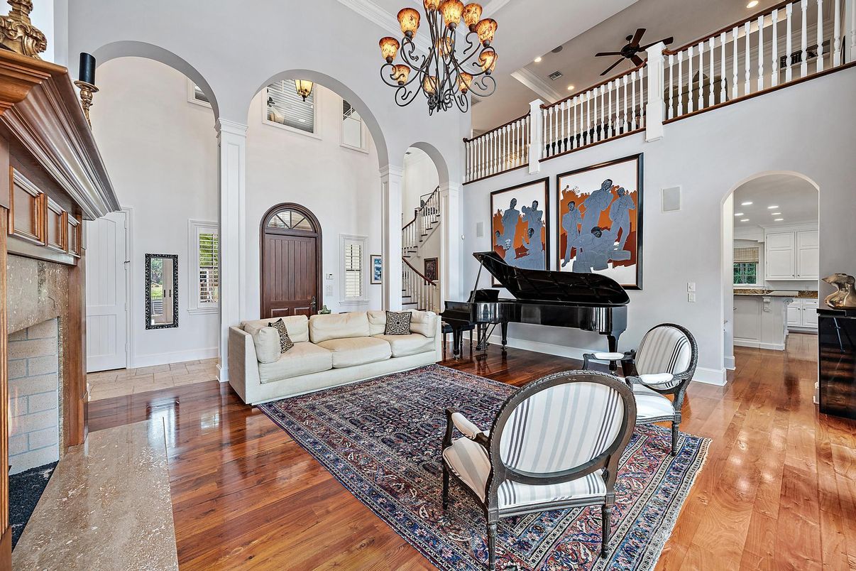Chandelier, Interior, Living room, Piano, Recessed Lighting, Wood Texture Flooring