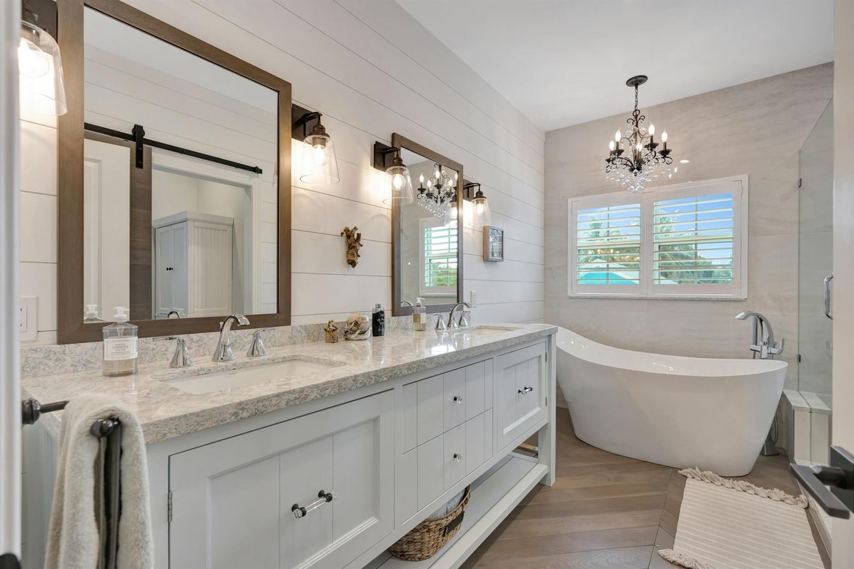 Bathroom, Chandelier, Dual Sink Vanities, Free Standing Baths, Interior, Wood Texture Flooring