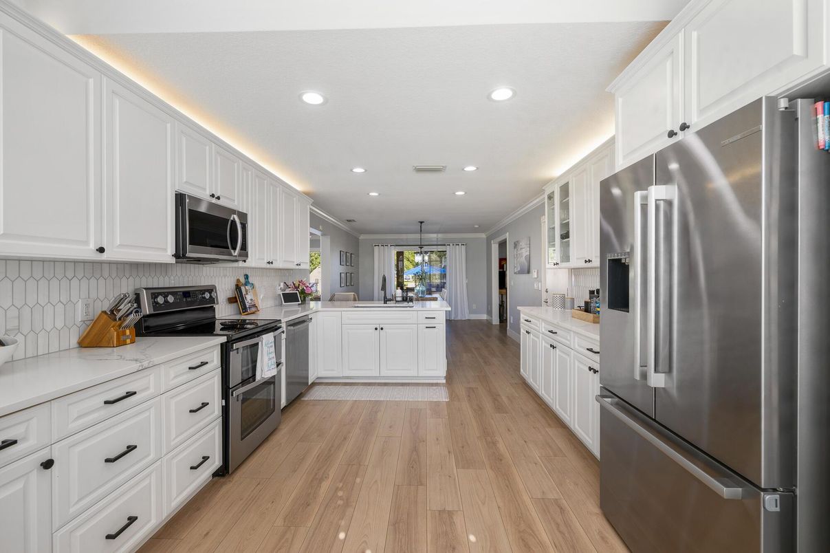 Interior, Kitchen, Pendant Lights, Recessed Lighting, Stainless Steel Appliances, Wood Texture Flooring