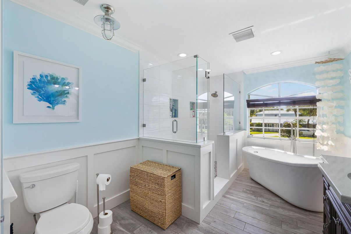Bathroom, Free Standing Baths, Glass Shower, Interior, Recessed Lighting, Wood Texture Flooring
