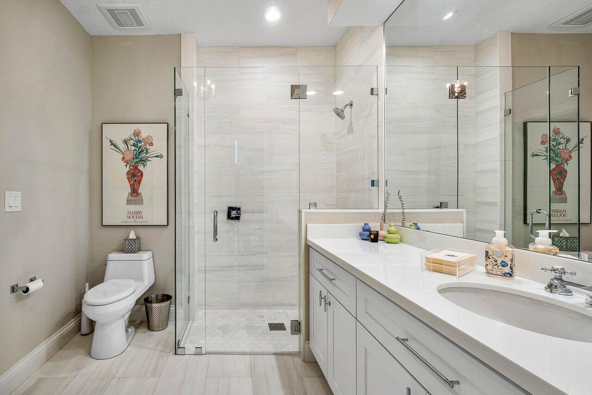 Bathroom, Dual Sink Vanities, Glass Shower, Interior, Recessed Lighting, Wood Texture Flooring
