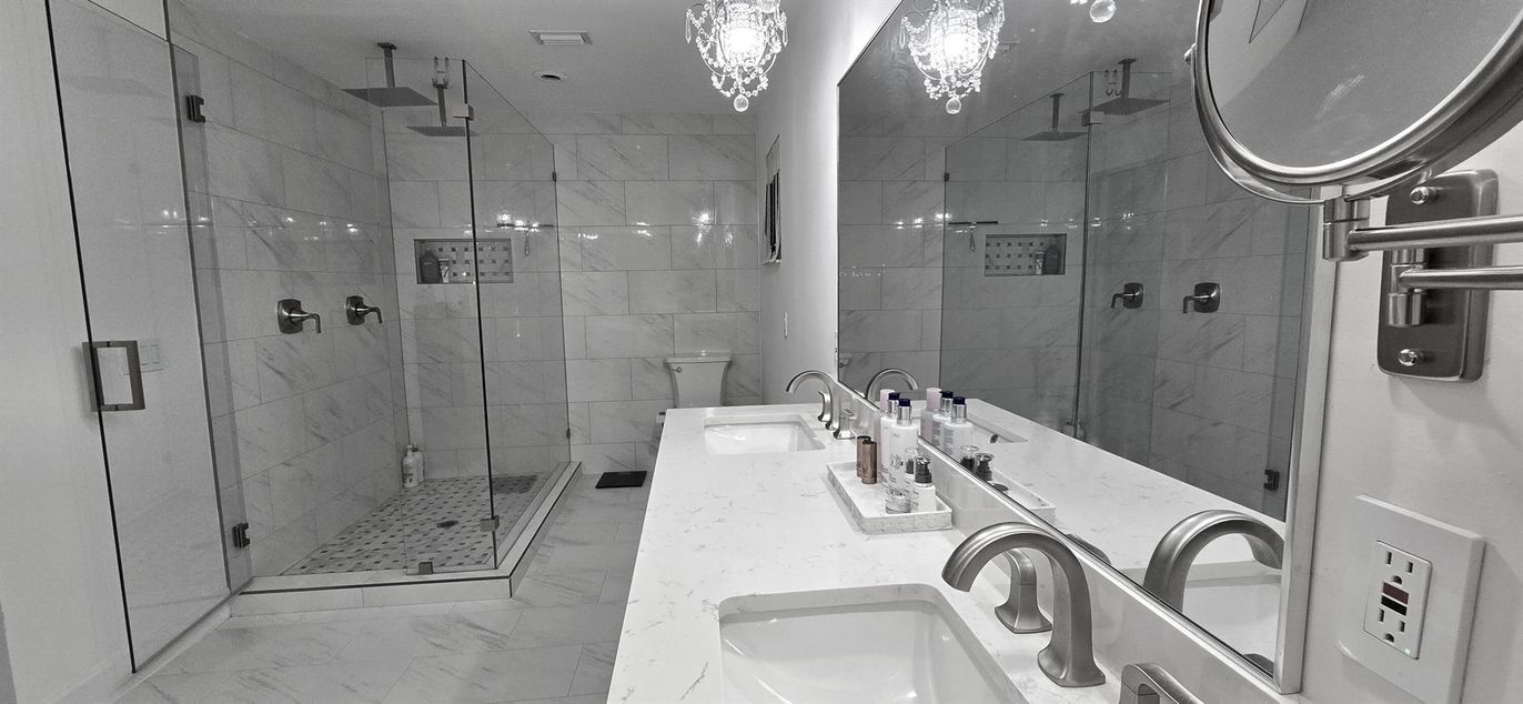 Bathroom, Chandelier, Dual Sink Vanities, Glass Shower, Interior, Marble, Marble Walls