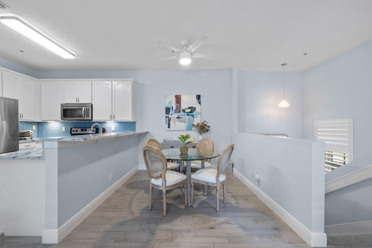 Dining room, Interior, Kitchen, Pendant Lights, Stainless Steel Appliances, Wood Texture Flooring