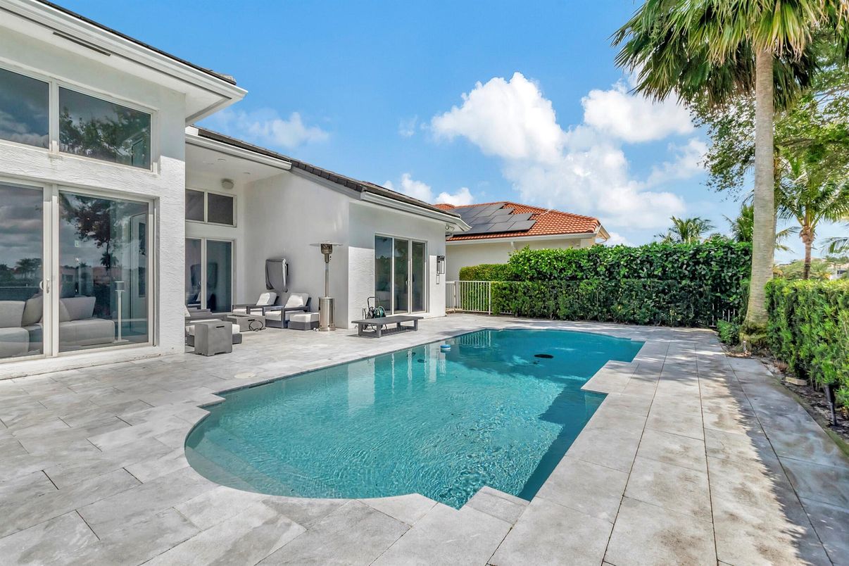 Exterior, Pool, Solar Panels