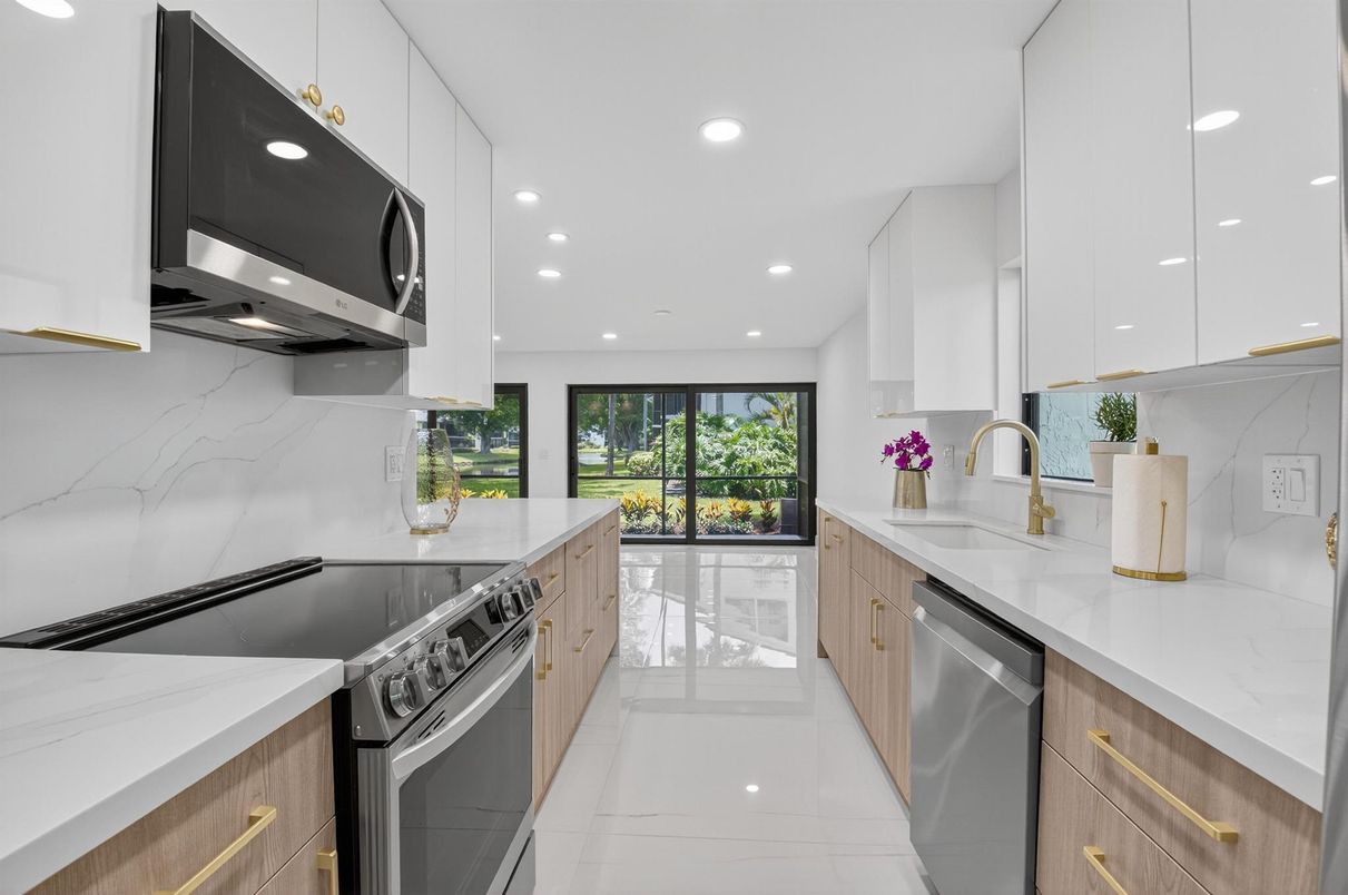 Interior, Kitchen, Marble, Marble Walls, Recessed Lighting, Stainless Steel Appliances