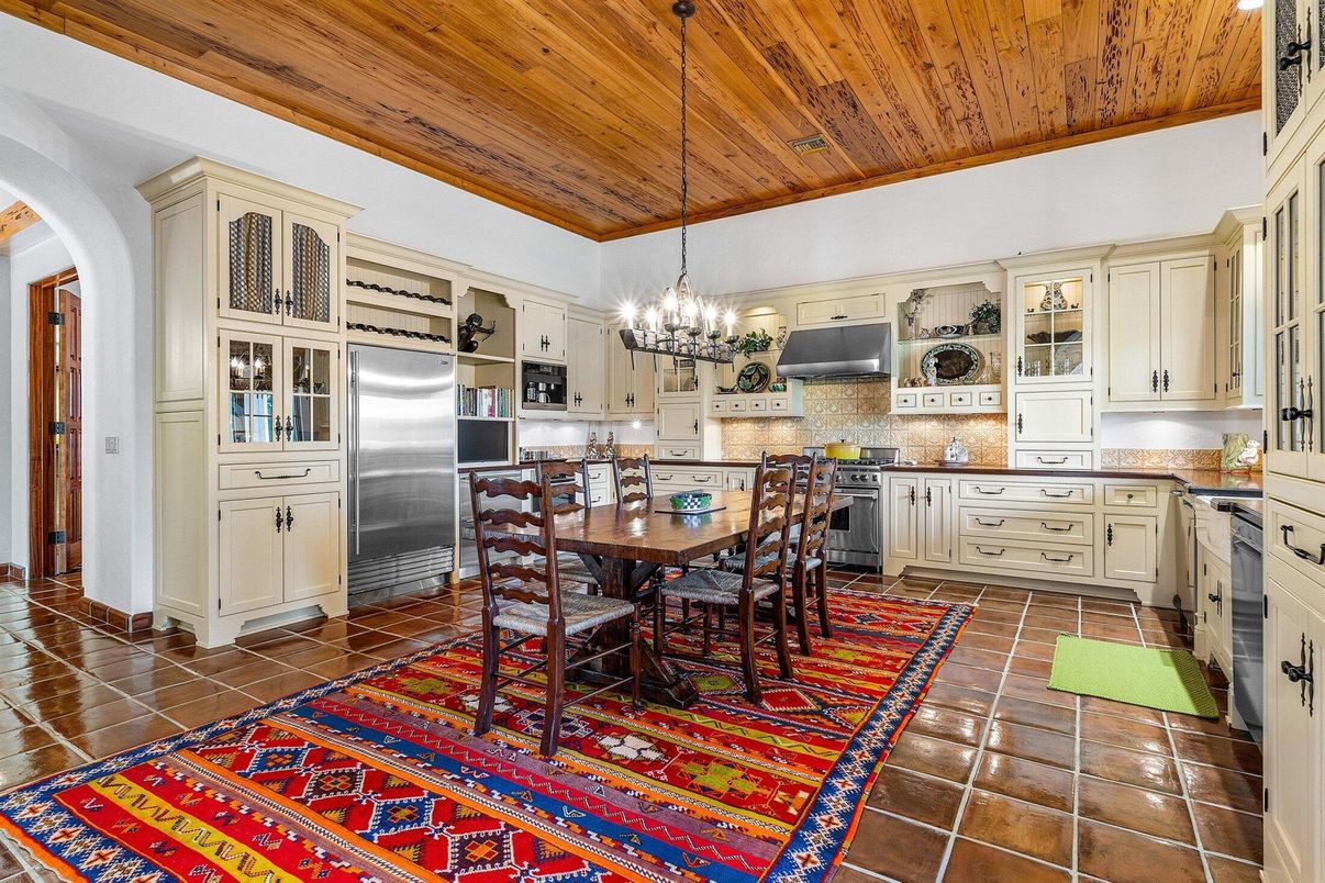 Chandelier, Dining room, Interior, Kitchen, Pendant Lights, Stainless Steel Appliances, Wooden Ceilings