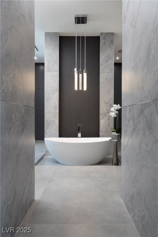 Bathroom, Free Standing Baths, Interior, Marble Walls, Pendant Lights, Recessed Lighting