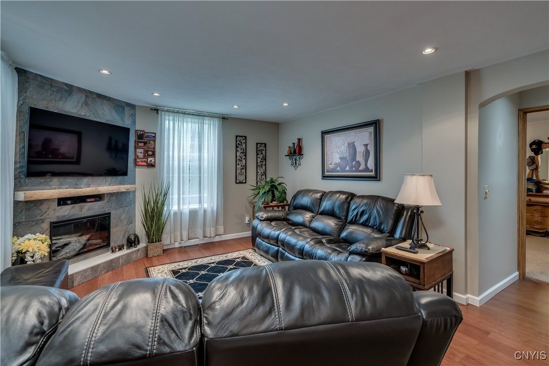 Fireplace, Interior, Living room, Recessed Lighting, Wood Texture Flooring