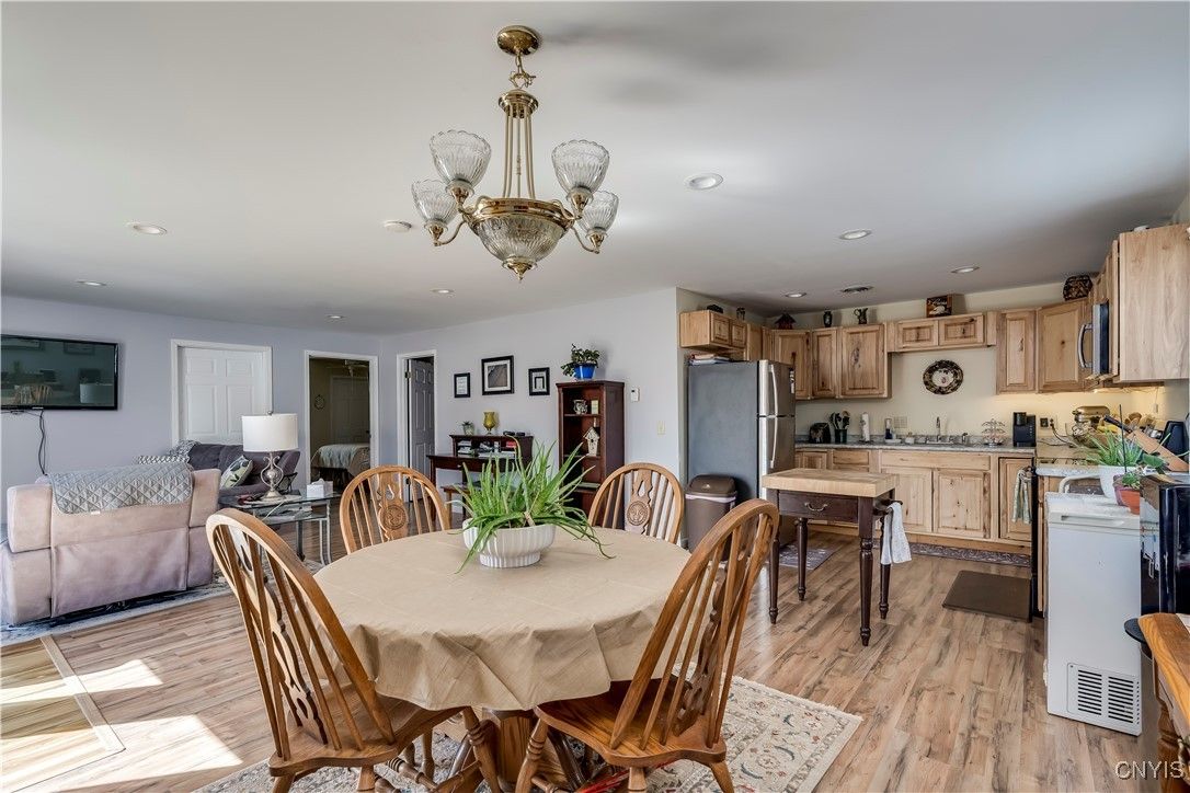 Chandelier, Dining room, Interior, Kitchen, Living room, Recessed Lighting, Wood Texture Flooring