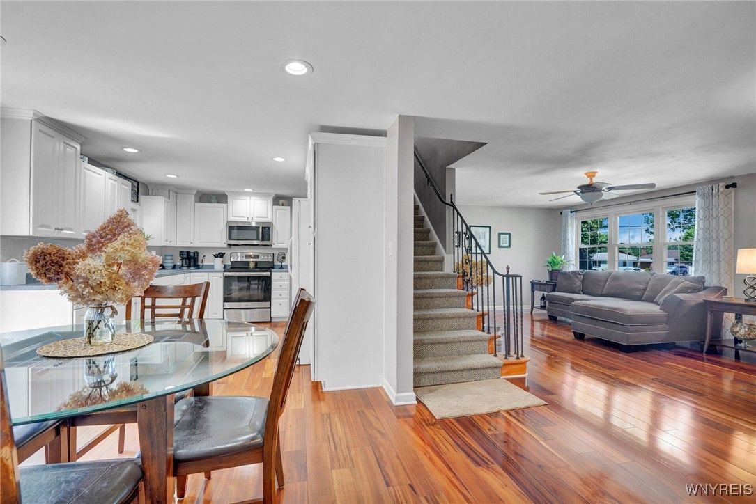 Dining room, Interior, Kitchen, Living room, Recessed Lighting, Stainless Steel Appliances, Wood Texture Flooring