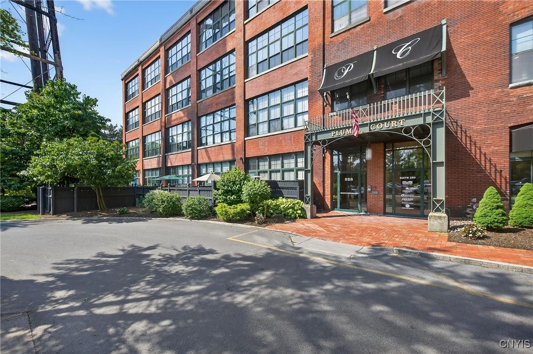 Exterior, Facade, Brick Facade, Condo Building