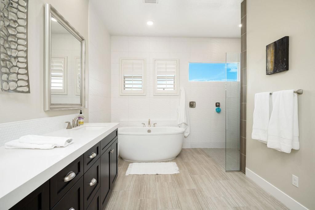 Bathroom, Dual Sink Vanities, Free Standing Baths, Glass Shower, Interior, Recessed Lighting, Wood Texture Flooring