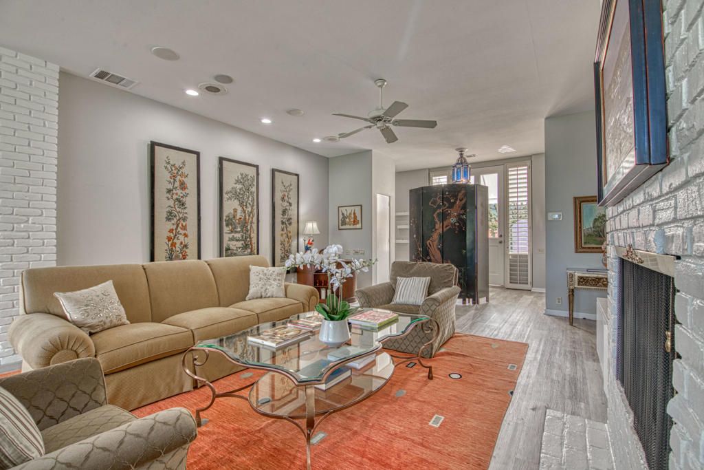 Fireplace, Interior, Living room, Recessed Lighting, Stone Walls, Wood Texture Flooring