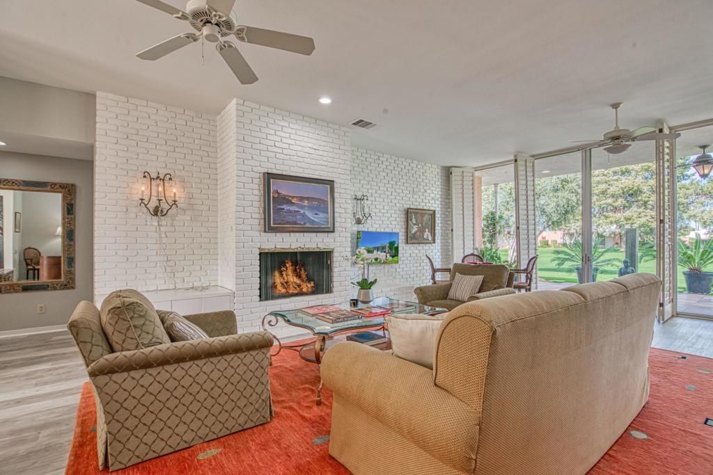 Fireplace, Interior, Living room, Recessed Lighting, Stone Walls, Wood Texture Flooring
