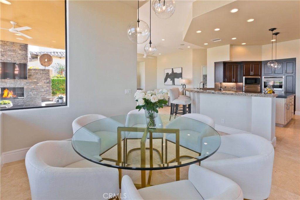 Dining room, Fireplace, Interior, Kitchen, Pendant Lights, Recessed Lighting, Stainless Steel Appliances, Stone Walls