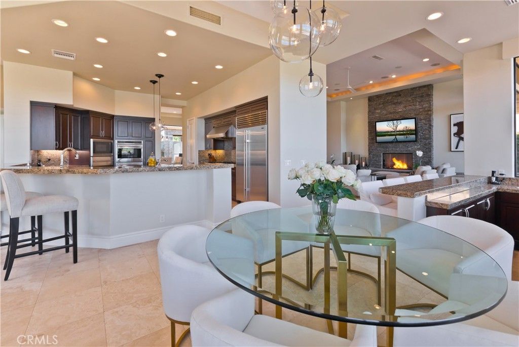 Dining room, Fireplace, Interior, Kitchen, Living room, Pendant Lights, Recessed Lighting, Stainless Steel Appliances, Stone Walls
