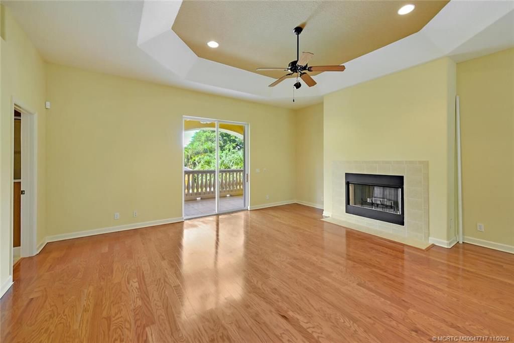 Empty room, Fireplace, Interior, Recessed Lighting, Wood Texture Flooring