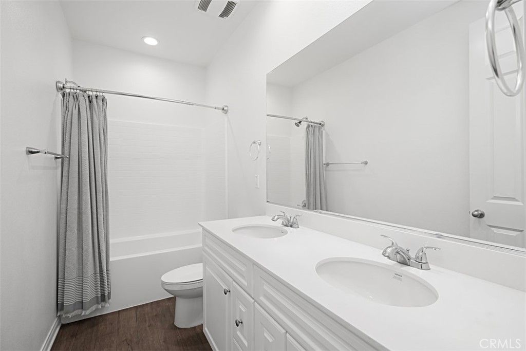 Bathroom, Dual Sink Vanities, Interior, Recessed Lighting, Wood Texture Flooring