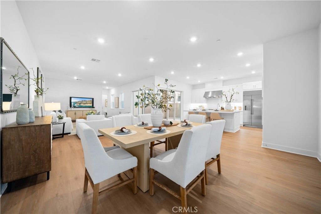 Dining room, Interior, Kitchen, Living room, Recessed Lighting, Stainless Steel Appliances, Wood Texture Flooring