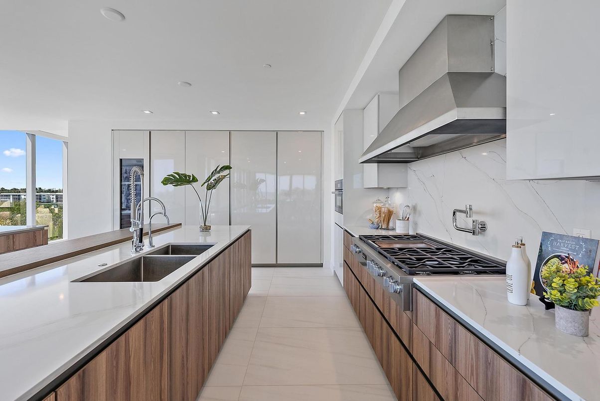 Interior, Kitchen, Marble Walls, Recessed Lighting, Stainless Steel Appliances
