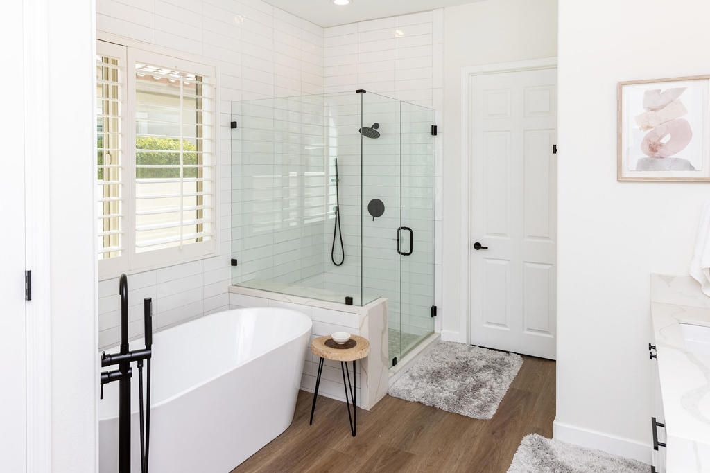 Bathroom, Free Standing Baths, Glass Shower, Interior, Recessed Lighting, Wood Texture Flooring