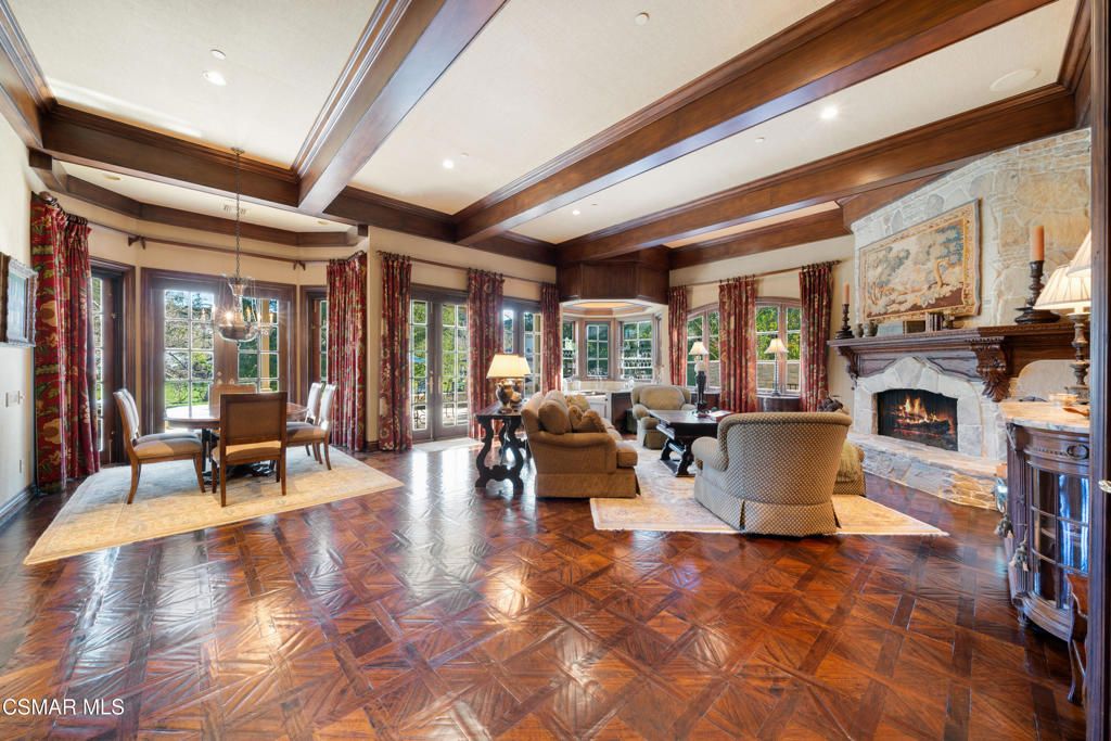 Dining room, Fireplace, Interior, Living room, Pendant Lights, Recessed Lighting, Wooden Beams, Wood Texture Flooring