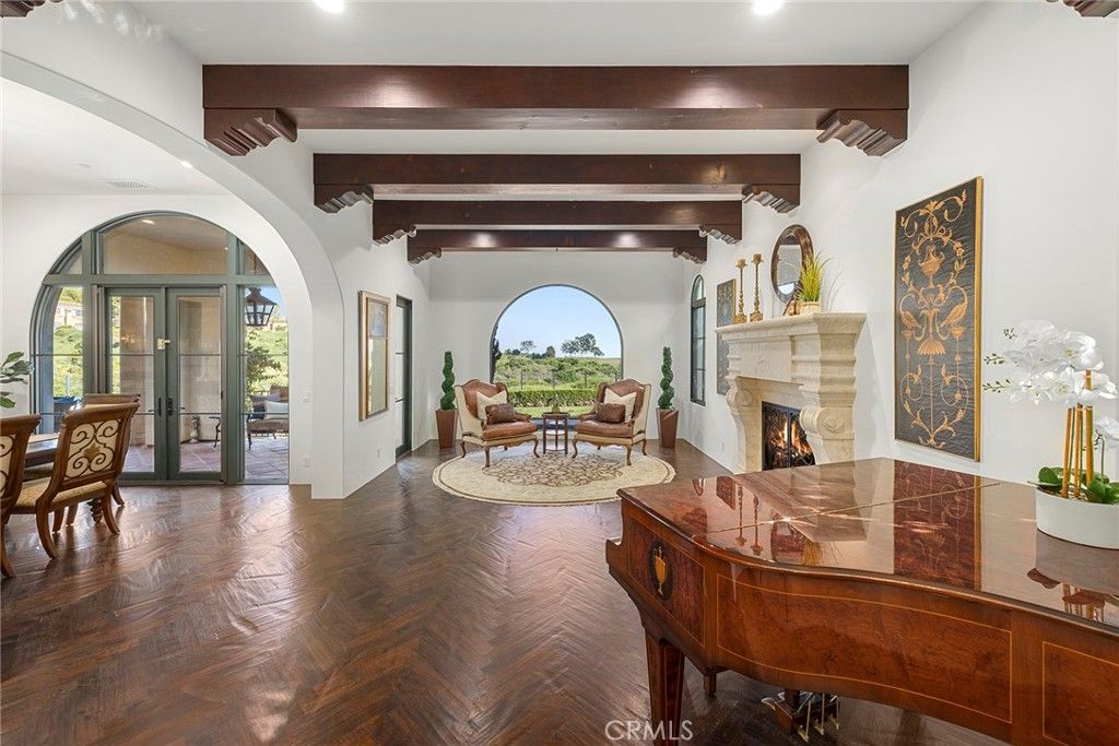 Dining room, Fireplace, Interior, Living room, Piano, Recessed Lighting, Wooden Beams, Wood Texture Flooring