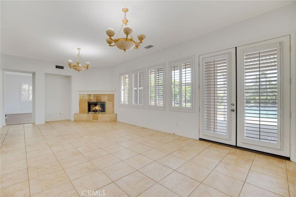 Chandelier, Empty room, Fireplace, Interior